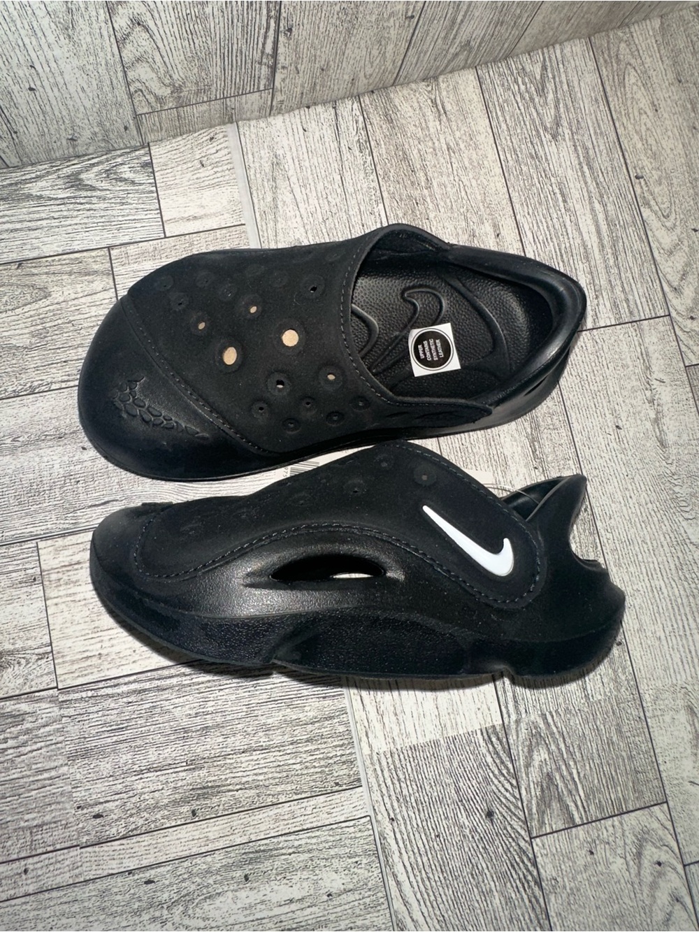 Nike Kids Black Slip-On Sport Sandals with White Swoosh Accent